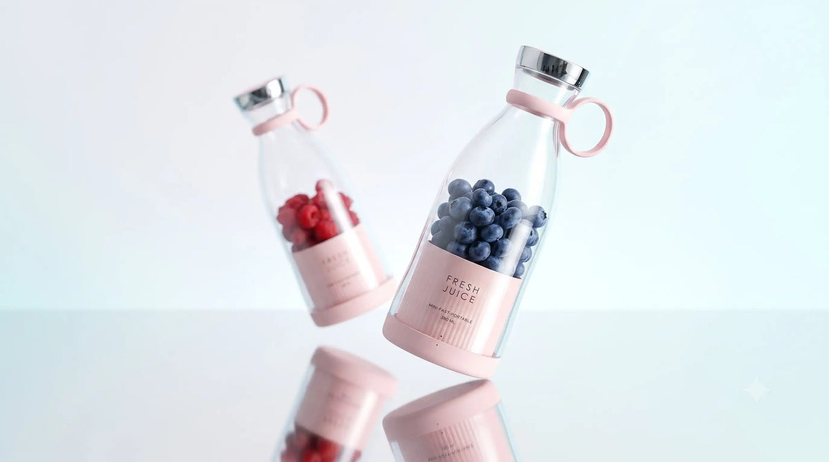 Portable mini blender for fresh juice on a table
